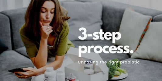 Woman choosing the best probiotic for women in a 3-step process at home