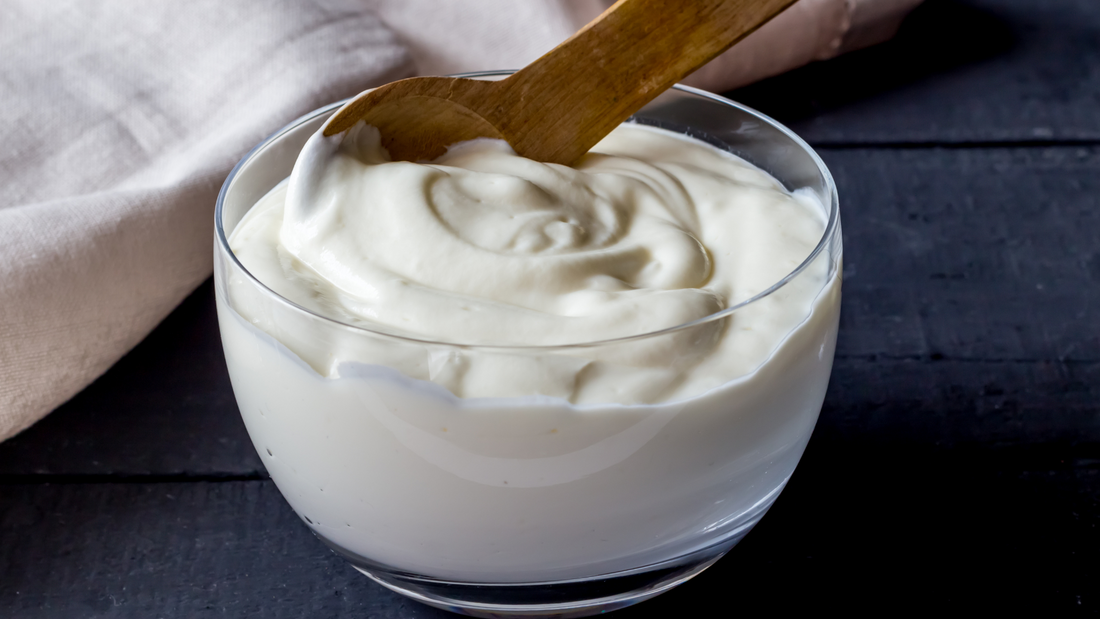 Bowl of plain yogurt natural remedy for vaginal discharge and infections